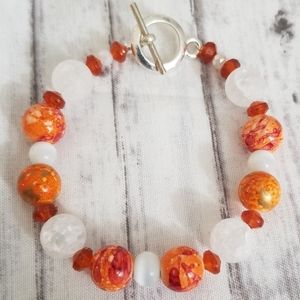 Orange and white glass bead bracelet